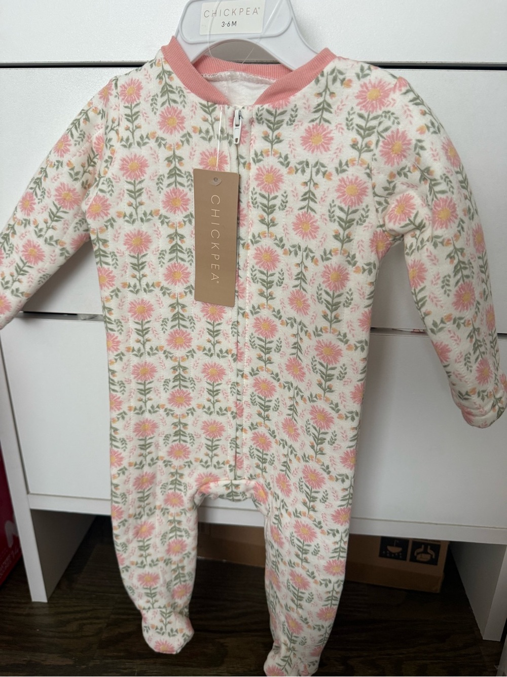 chick pea Cream Footie with Pink Floral Print and Green Leaves